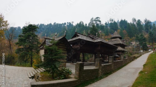 View of the Tripura Sundari Temple near Naggar Castle at Naggar in Himachal Pradesh, India. Ancient Temple made from wood with delicate carvings. Pagoda Style temple near Manali. photo