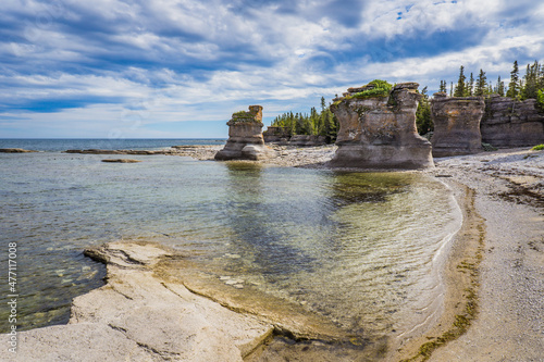 view on the limestone monoliths and rock formations on Niapiskau island in Mingan Archipelago National Park in Cote Nord region of Quebec, Canada