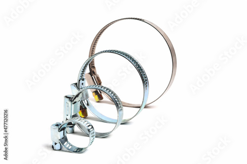 Fotografie hose clip, round worm tightening clamps on white background, close-up