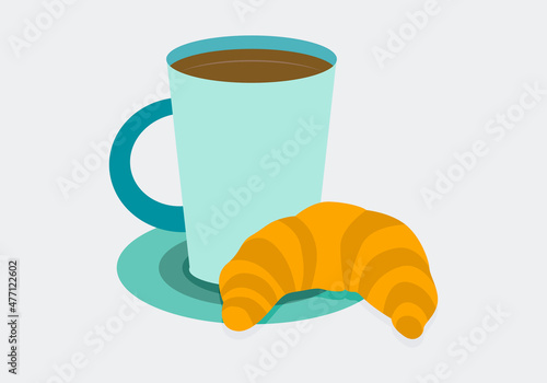 Taza azul con chocolate y croissant. 