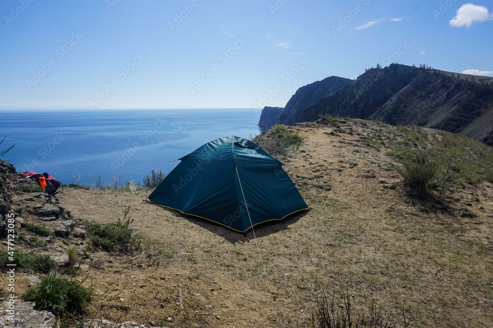 Tent on the rocky coast of Olkhon Island