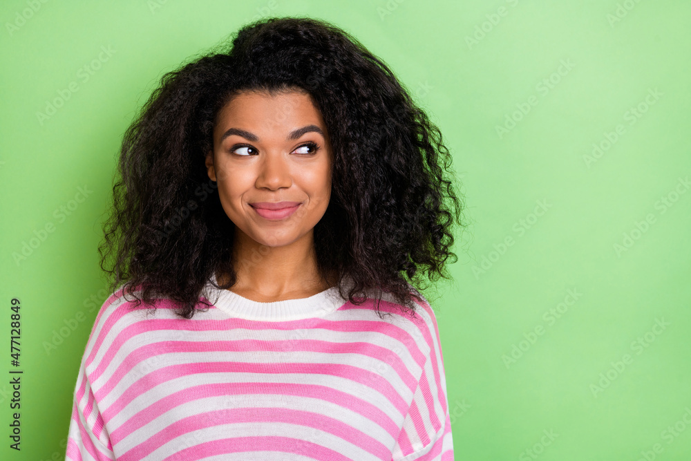 Fototapeta premium Photo of young pretty woman curious think look empty space minded isolated over green color background