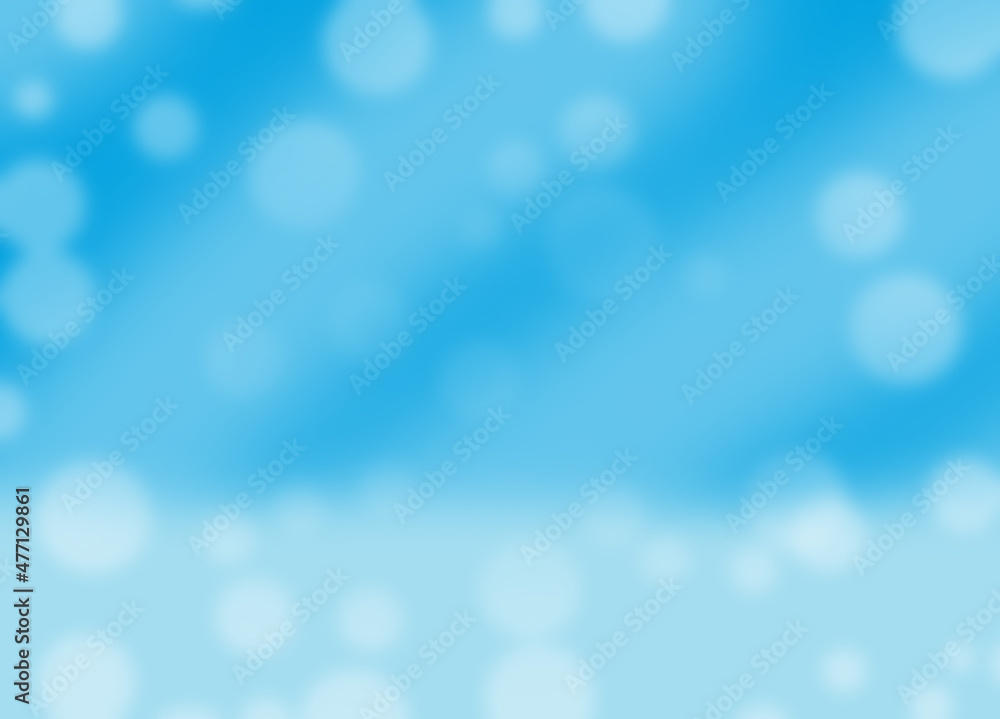 White bokeh on light blue background. White bokeh on light blue background.