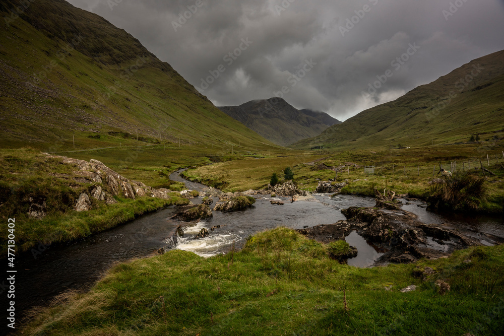 The Glenummera River in the Sheeffry Mountains flows into Dou Lough county Mayo, Ireland The Glenummera River in the Sheeffry Mountains flows into Dou Lough county Mayo, Ireland