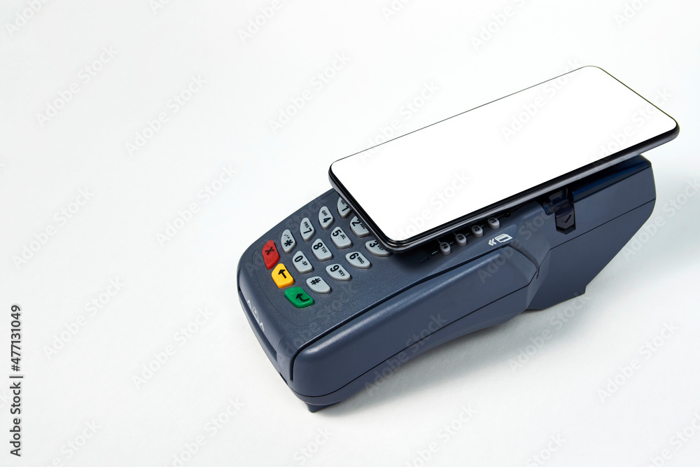 Payment terminal and phone on white background Payment terminal and phone on white background