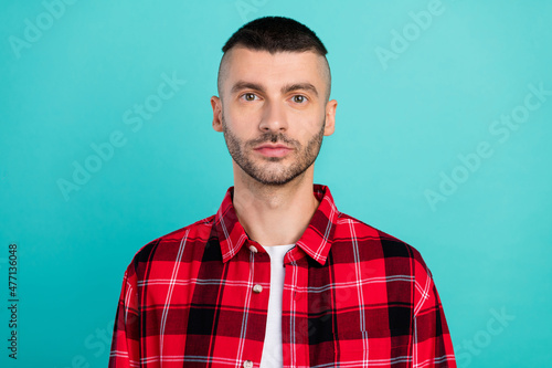 Photo of nice young brunet guy wear red shirt isolated on teal color background