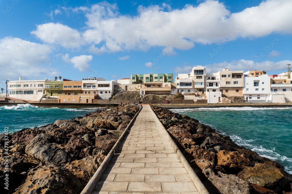 Pozo Izquierdo overlook with breakwater with a sidewalk, Gran Canaria, Spain