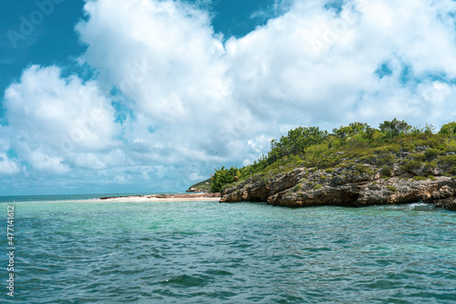 Fototapeta Naklejka Na Ścianę i Meble -  Green Island, a small and uninhabited island just off Nonsuch Bay, Antigua, Caribbean