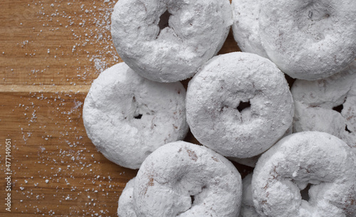 Overhead view of powdered donuts or doughnuts