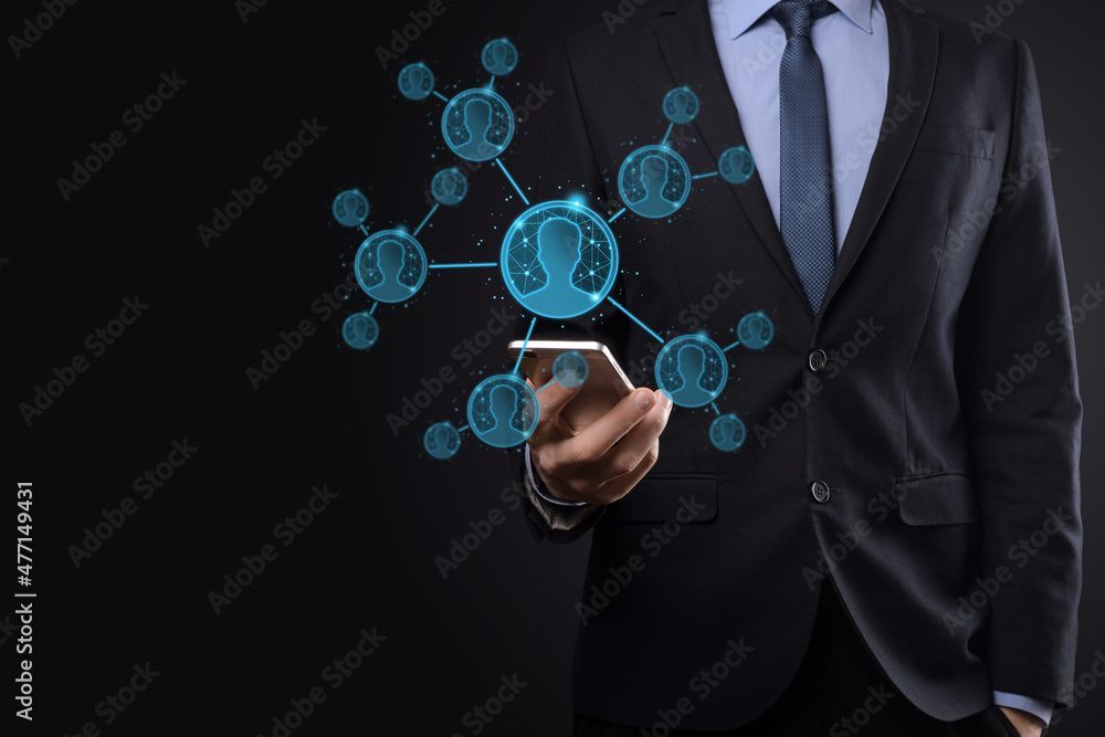 Businessman holding on hand icon of user man,woman low poly polygon style. Internet icons interface foreground. global network media concept. Businessman holding on hand icon of user man,woman low poly polygon style. Internet icons interface foreground. global network media concept.