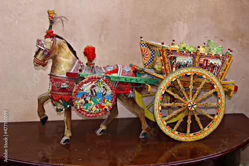 Italy, Sicily Island: Miniature of Sicilian cart