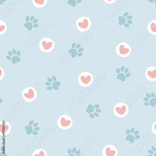 Pet paw seamless pattern.Vector illustration with paw and hearts on blue background. It can be used for wallpapers, wrapping, cards, patterns for clothes and other.