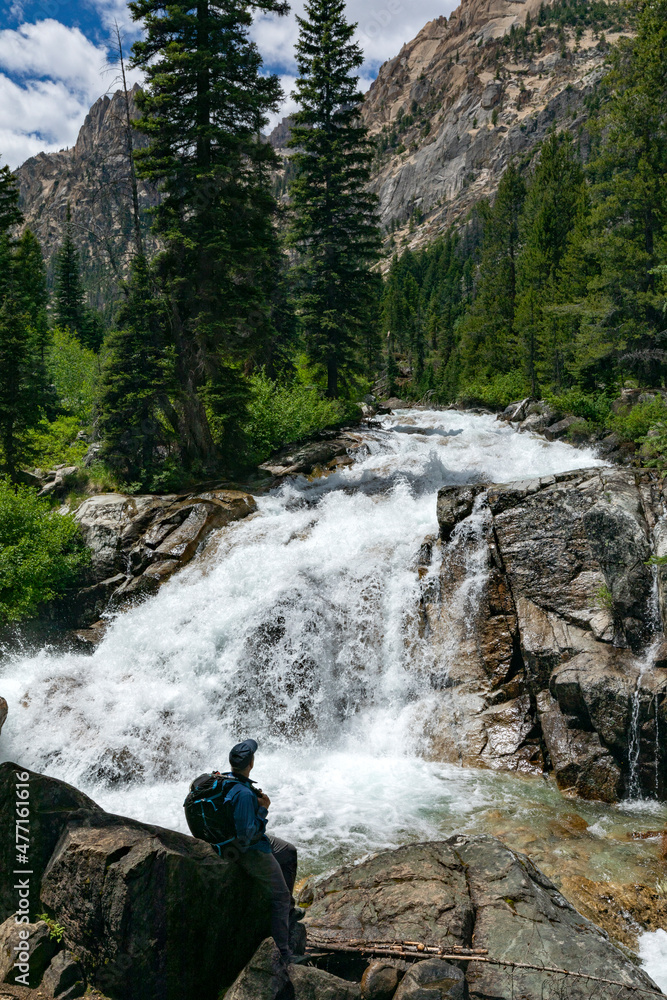 USA, Idaho, Stanley, Man hiking by mountain waterfall near Sun Valley USA, Idaho, Stanley, Man hiking by mountain waterfall near Sun Valley