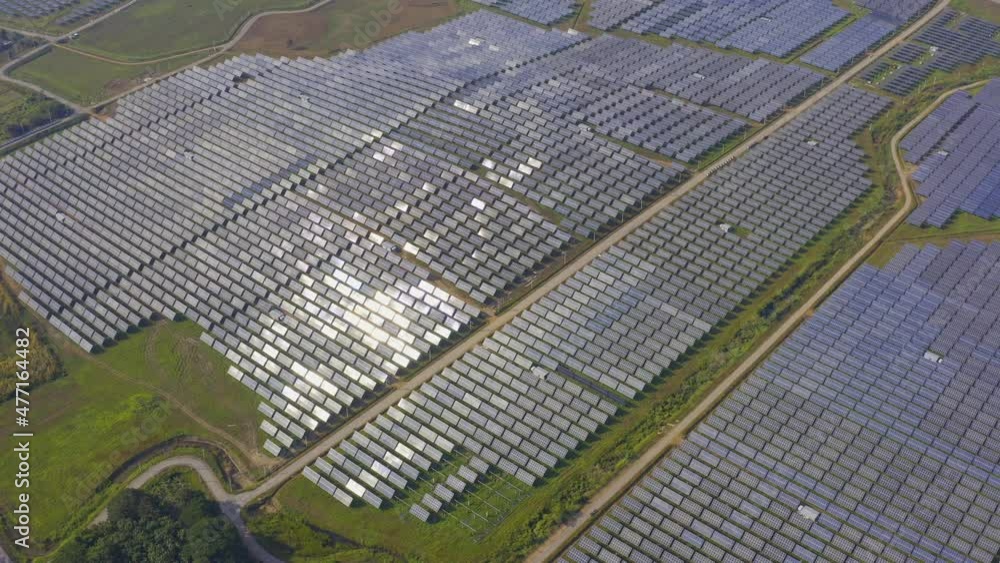 aerial view of a solar farm A large clean energy source solar power. aerial view of a solar farm A large clean energy source solar power.