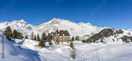 Panorama of the winther landscape of Swiss Alps village Riederalp with the Pro Nature Center Villa Cassel  photo