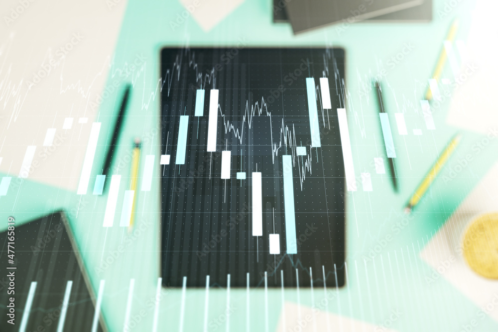 Double exposure of abstract creative financial diagram and modern digital tablet on background, banking and accounting concept Double exposure of abstract creative financial diagram and modern digital tablet on background, banking and accounting concept