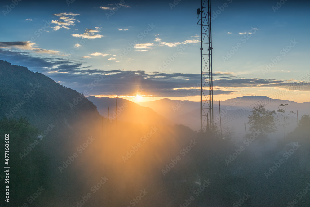 Sun rise behind Himalayan Mountains - shot from inside of a glass ...