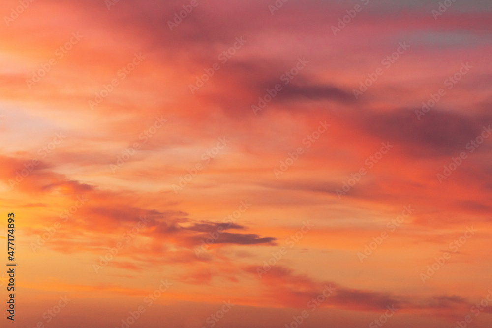 Beautiful stormy sunset sky.Beautiful clouds with light of sunset in blue sky