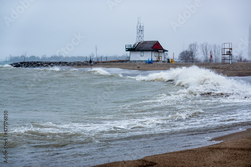 Winter waves arrive on the shore of Lake Ontario in Toronto’s iconic Beaches neighbourhood as a small snow storm begins. Shot in in late December
