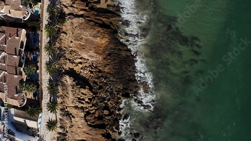 Wallpaper Mural Cinematic Luz beach aerial view. Sunny drone flight over coastal line, beautiful houses and blue water with surfers. Torontodigital.ca