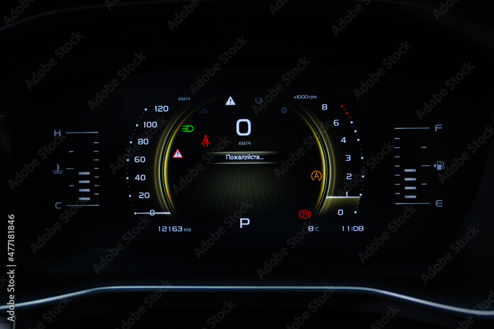 Modern digital car mileage. Car dashboard with sensors and information. RPM, Fuel indicator and temperature. Modern digital car mileage. Car dashboard with sensors and information. RPM, Fuel indicator and temperature.