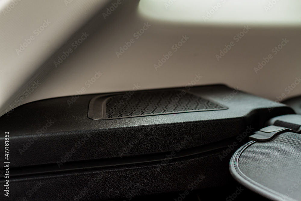 Close up speaker on car door. Sound speaker in a modern car. Close up speaker on car door. Sound speaker in a modern car.