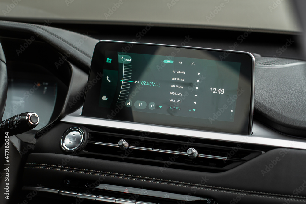 Digital car radio. Modern car radio in car. Smart multimedia touchscreen system. Digital car radio. Modern car radio in car. Smart multimedia touchscreen system.