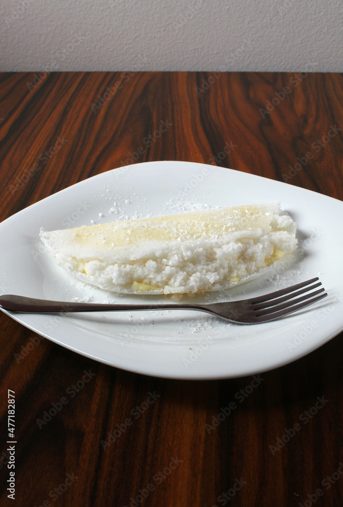 Coconut tapioca with condensed milk. Brazilian dessert. Coconut tapioca with condensed milk. Brazilian dessert.