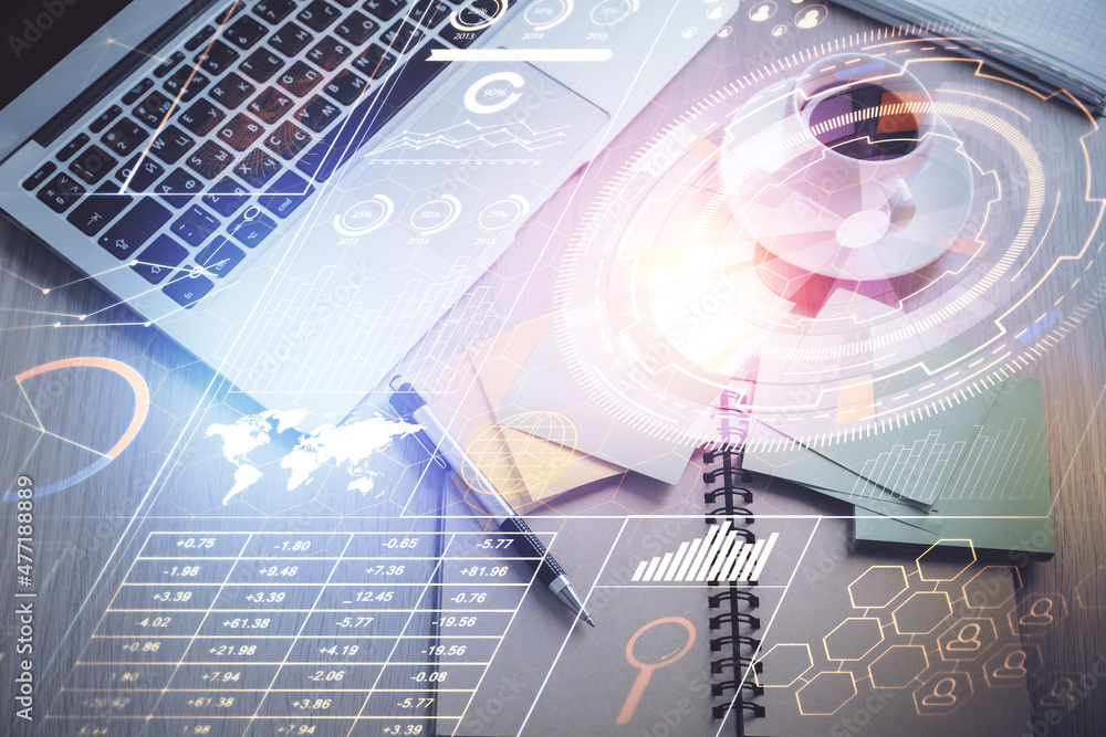 Double exposure of data theme drawing hologram over topview work table background with computer. Concept of technology. Double exposure of data theme drawing hologram over topview work table background with computer. Concept of technology.
