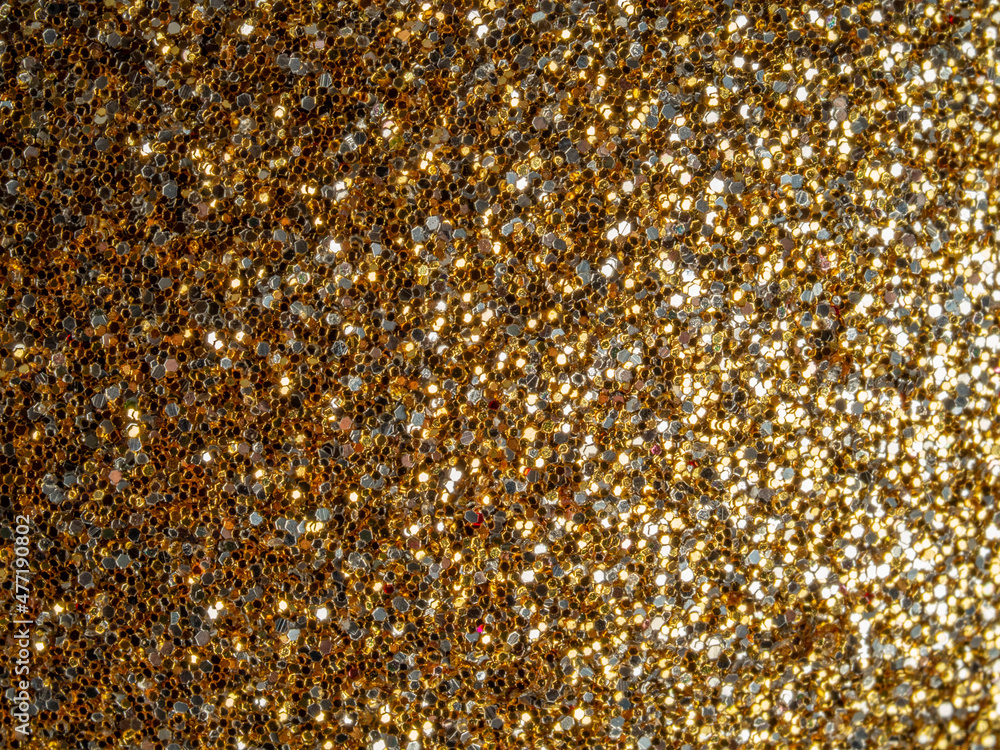 a gold glitters background texture a gold glitters background texture