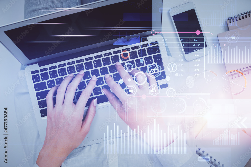 Double exposure of woman hands working on computer and data theme hologram drawing. Top View. Technology concept. Double exposure of woman hands working on computer and data theme hologram drawing. Top View. Technology concept.