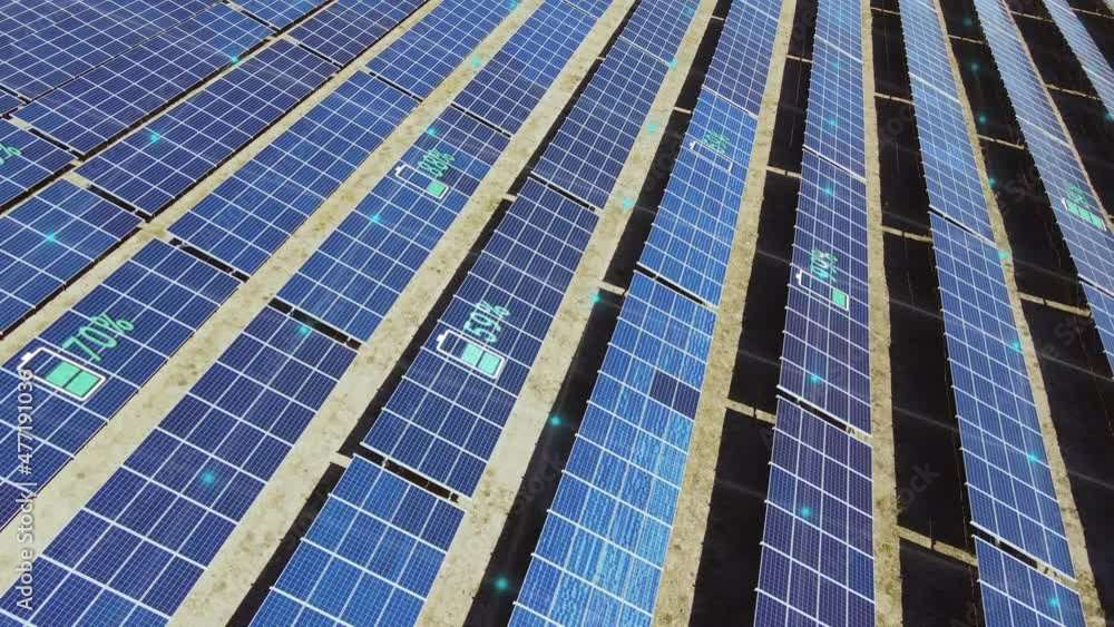 Solar Panels Farm with animation graphics of charging battery. Flight fly over solar cell panels field. Renewable Alternative Green Energy Concept Solar Panels Farm with animation graphics of charging battery. Flight fly over solar cell panels field. Renewable Alternative Green Energy Concept