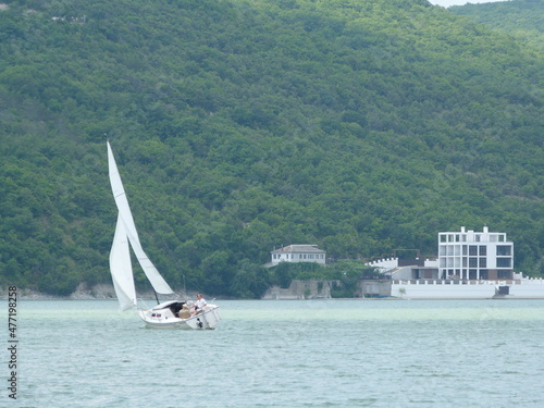 Yacht in the middle of a mountain lake