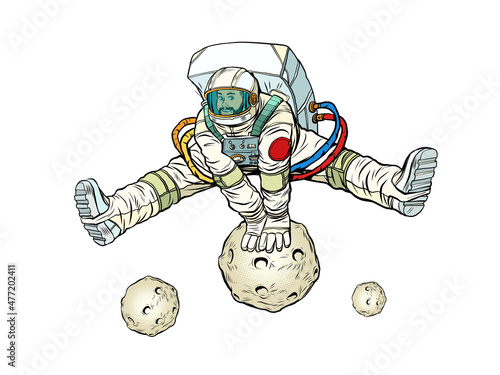 The astronaut rejoices jumping up through an asteroid or planet in a funny pose with his legs apart. Space and science