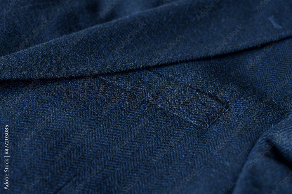 Naklejka premium Detail of men casual outwear, blue woolen blazer, with a pocket fragment.