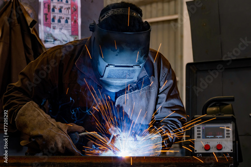 Welding of metal structures by semi-automatic arc welding. MIG welding.