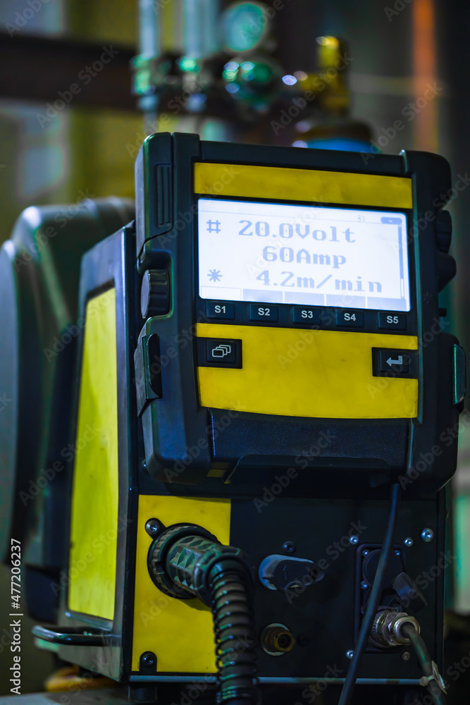 A modern semi-automatic welding machine with great functionality in the production hall. MIG welding. A modern semi-automatic welding machine with great functionality in the production hall. MIG welding.
