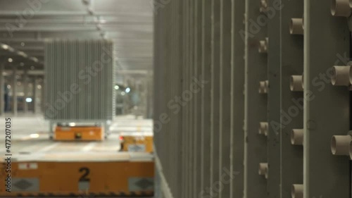 Tracking Shot Robotic Carrier Moving in a Ceramic Tile Plant