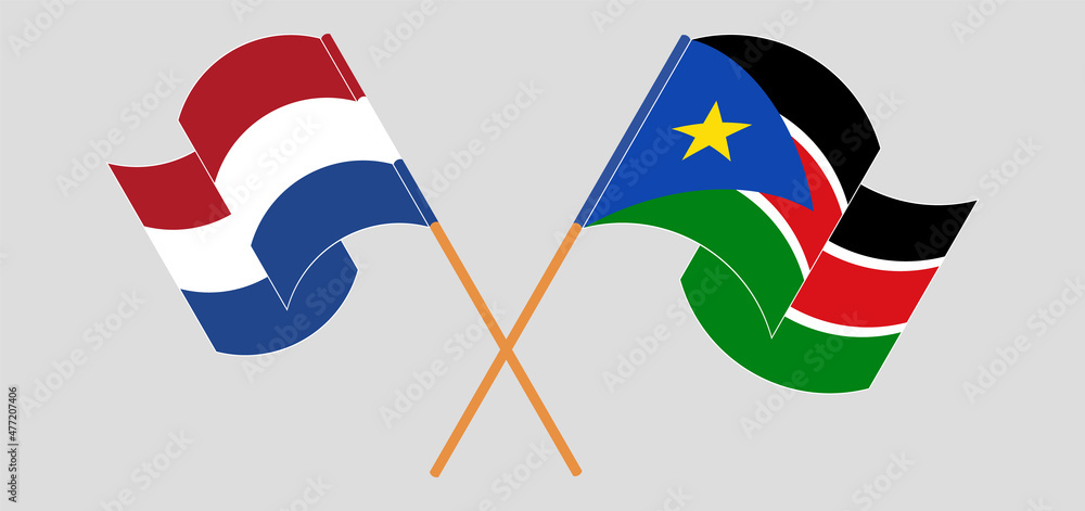 Crossed and waving flags of the Netherlands and South Sudan Crossed and waving flags of the Netherlands and South Sudan