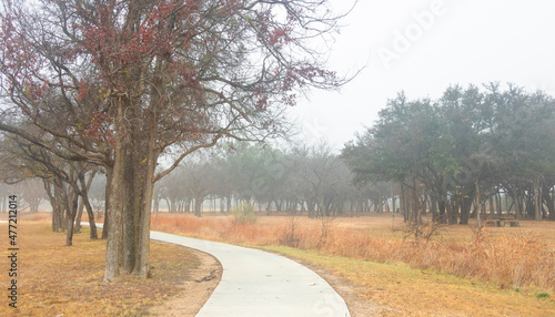 Brownwood Texas walking trail festival park, during foggy mourning, relaxing panorama view, recreation area.