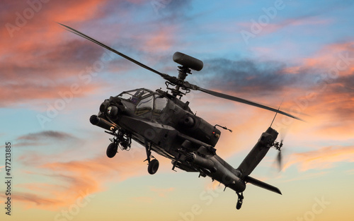Apache attack helicopter at sunset photo