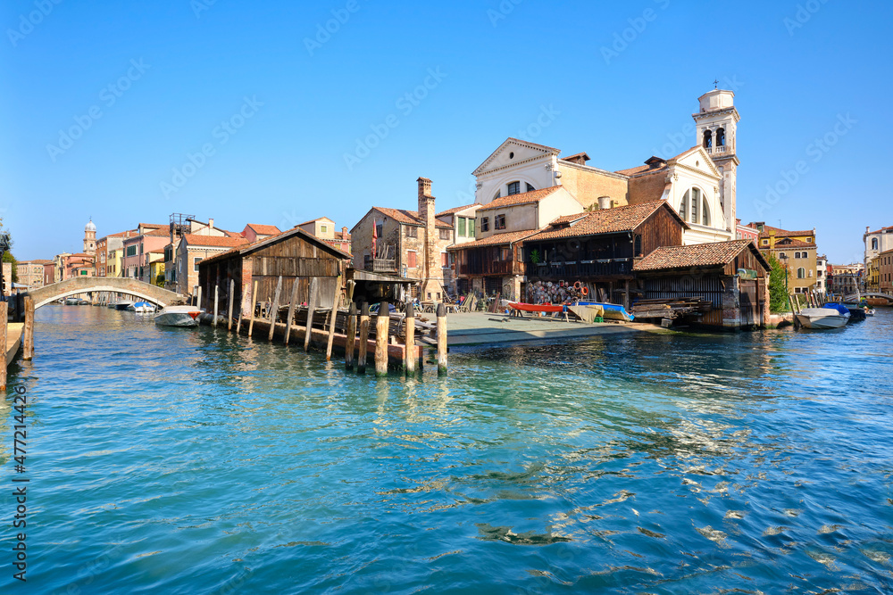 Romantic Venice, Squero di San Trovaso, famous boatyard in Venice. Landmark boat yard for building and repair of traditional wooden gondolas.