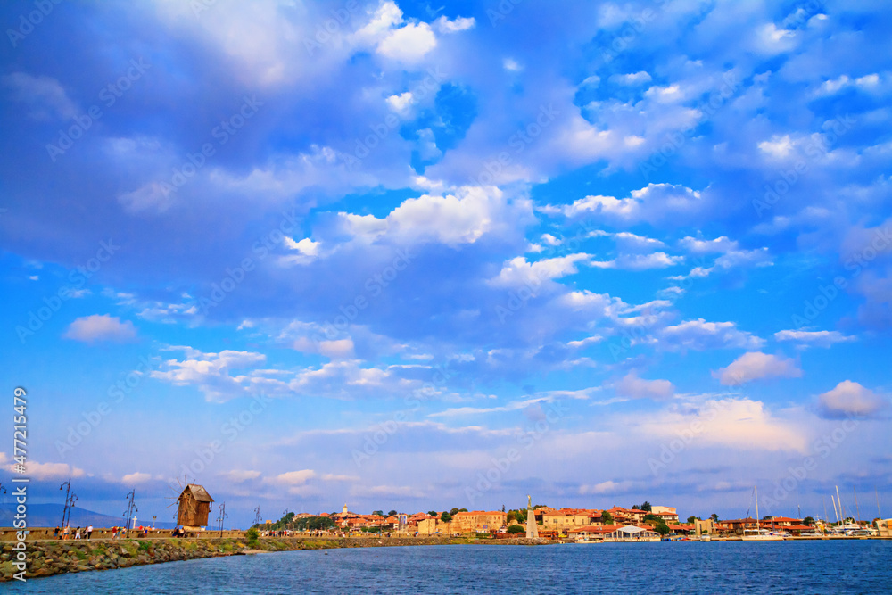 Seaside landscape - view of the Old Town of Nessebar in the rays of the sun, on the Black Sea coast of Bulgaria