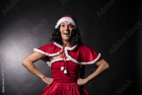 Woman Christmas dress. Fun. Smile. woman in red dress