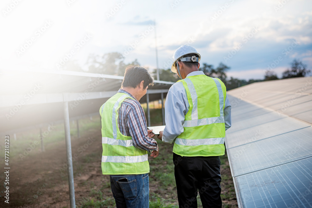 Engineer working to inspect equipment in a solar power plant. Engineer working to inspect equipment in a solar power plant.