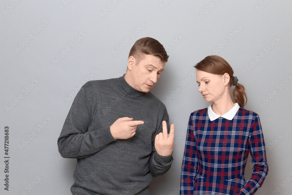Portrait of man and woman talking and arguing, relationship concept Portrait of man and woman talking and arguing, relationship concept