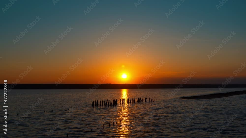 Aerial coastline view with calm landscape in background. Amazing ocean sunset. Aerial coastline view with calm landscape in background. Amazing ocean sunset.