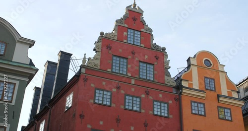 Unique And Colorful Structures In Gamla Stan, Stockholm, Sweden - panning shot photo