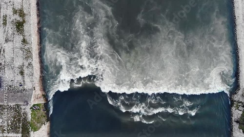 Approaching Vardar river height drop, top-down view of water flowing turbulently photo