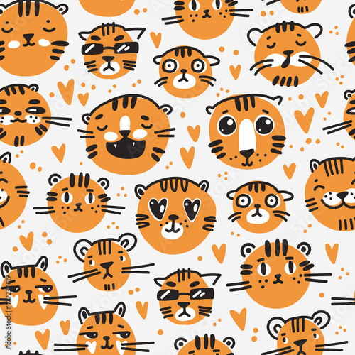 Seamless pattern with cute funny cartoon tigers in naive kid drawn style. Tiny animal muzzles.